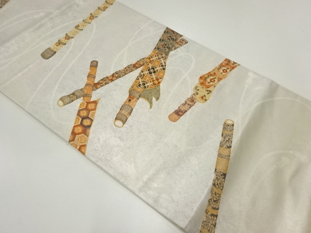 横笛模様織出し袋帯